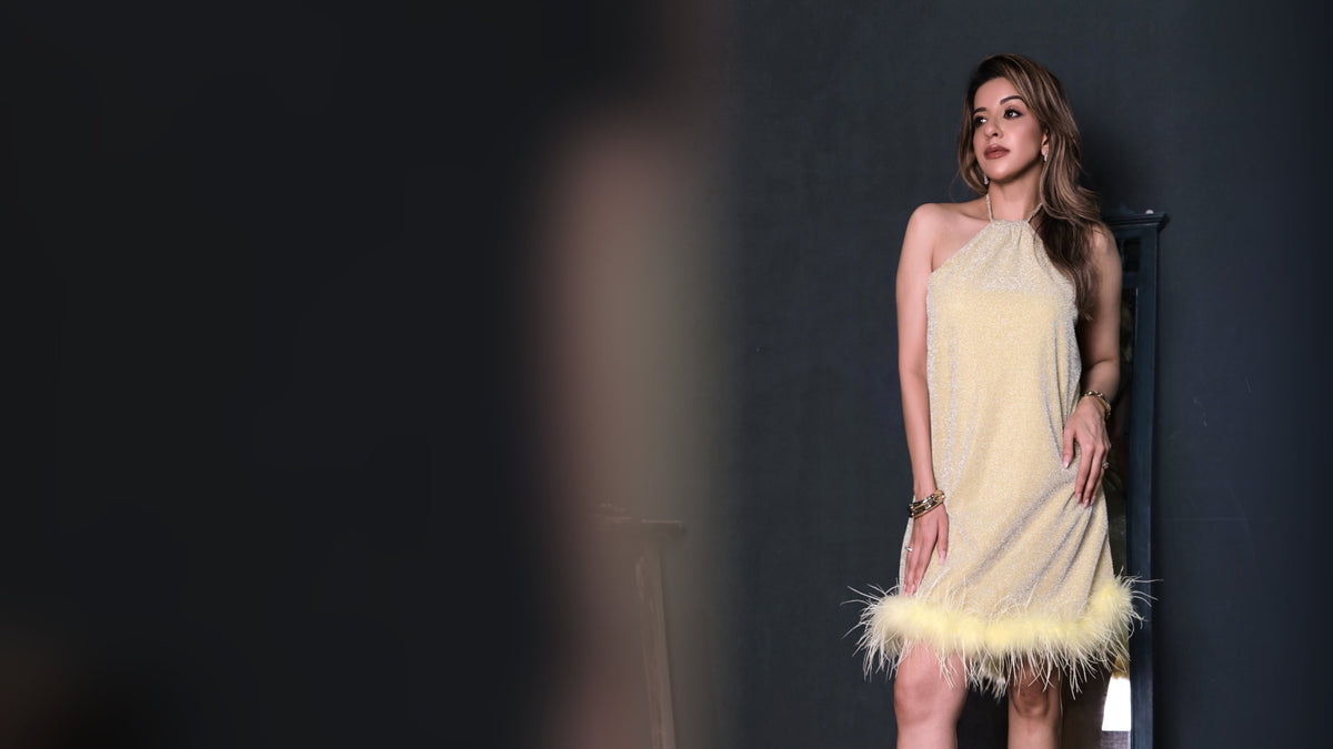 Model in an ivory pearl-embellished jumpsuit